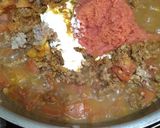 A picture of step 2 of Karahi qeema matar with brown onion rice.