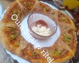 صورة لخطوة 3 من وصفة بيتزا دوار الشمس 🍕 بشكل مختلف 🍕