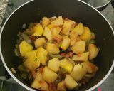 Foto del paso 3 de la receta: Patatas guisadas con pollo a l'ast en un plis plas y económicos
