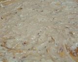A picture of step 5 of Malai boti pizza with white sauce.