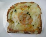 Foto del paso 4 de la receta: Tostadas con camarones en salsa gratinados
