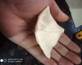 A picture of step 12 of Sweet dry fruit samosa.