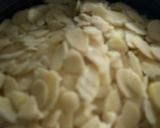A picture of step 2 of Dates filled with almond fudge.