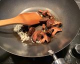 A picture of step 2 of Easy homemade stir fry honey and soy egg noodles with mushrooms.