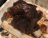 A picture of step 5 of Slow cooked beef rib with a shallot and lemonade dripping.