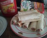 Une image de l'étape 3 de Roulé de pain de mie au saucisse.