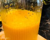 A picture of step 2 of Turmeric orange juice.
