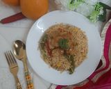 A picture of step 6 of Orange Chicken with fried rice.