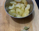 A picture of step 1 of Garlic amla instant pickle.