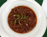A picture of step 13 of Nigerian carrot fried rice with minced meat soup.