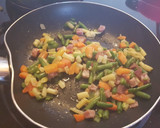 Foto del paso 2 de la receta: Arroz salteado al pimentón con verduras y jamón