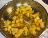 A picture of step 3 of Braised Potatoes with Spinach.