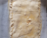 Foto del paso 2 de la receta: Empanada de hojaldre rellena de pisto, atún y huevo