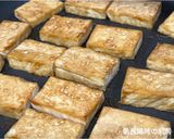 A picture of step 6 of Pan-Fried Tofu and Eggs with Oyster Sauce.