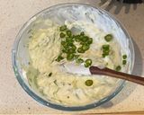 A picture of step 2 of Tzatziki (yoghurt and cucumber dip).