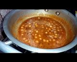 A picture of step 11 of Lahori halwa porri with aalo aur chana bhaaji.