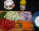 A picture of step 1 of Vegetables tadka raita.