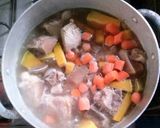 A picture of step 3 of Stew pork with pumpkin n carrot.