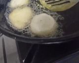 A picture of step 4 of Tomato Rasam vada.