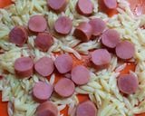 Foto del paso 3 de la receta: Riso con salchichas y queso crema