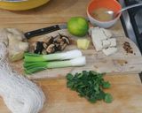 A picture of step 1 of Shitake miso soup with ginger and lime.