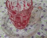 A picture of step 3 of Strawberry crushed milk shake with vanilla ice cream.