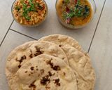 A picture of step 22 of Cauliflower Sabzi,Daal fry, Naan(wheat flour),Jeera rice,Salad and papad.