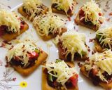 A picture of step 3 of Biscuit pizza.