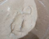 A picture of step 2 of Chickoo-chocochips icecream on white chocolate hearts.