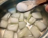 A picture of step 1 of Poosanikkai Mor Kootu (Ash gourd Mor Curry).