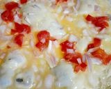 A picture of step 1 of Onion Tomato Omelette.