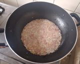 A picture of step 1 of Green Singaporiean Rice.