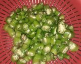 A picture of step 1 of Besan Mirchi Tipore.