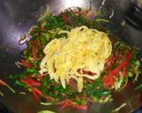A picture of step 6 of Chinese fried rice.