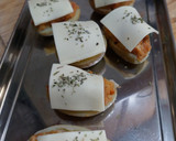 Foto del paso 4 de la receta: Patatas rellenas de boloñesa gratinadas