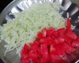 A picture of step 3 of Cucumber & Tomato Raita.