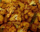 A picture of step 4 of Aloo Gobi Matar (Potato, Cauliflower, and Pea Curry).