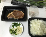 A picture of step 1 of Pork chop with onion.