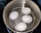 A picture of step 1 of Egg tawa masala.