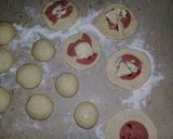 A picture of step 8 of Pizza Buns.