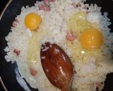 Foto del paso 3 de la receta: Arroz a la cubana con huevo, leche y salchichas