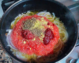Foto del paso 12 de la receta: Muslos de pollo en bolsa al horno en salsa de tomate confitado