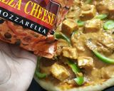 A picture of step 8 of Butter Paneer pizza.