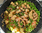 Foto del paso 4 de la receta: Guisantes con anillas de calamar