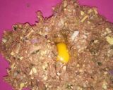 A picture of step 3 of Cheesy meatballs in sauce.