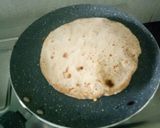 A picture of step 7 of Alu paneer paratha serve with boondi raita.