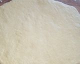 A picture of step 4 of Vanilla cream filled doughnuts.