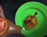 A picture of step 6 of Mango Pancakes with Almonds and Caremal Sauce.
