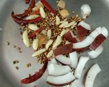 A picture of step 1 of Sukha Chicken Malwani Touch.