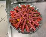 A picture of step 8 of Beef Carpaccio with Heirloom Tomatoes and Parmesan.
